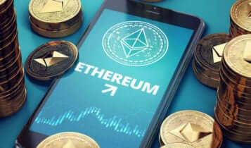 Ethereum logo and a chart below shown on a mobile phone with coins scattered around