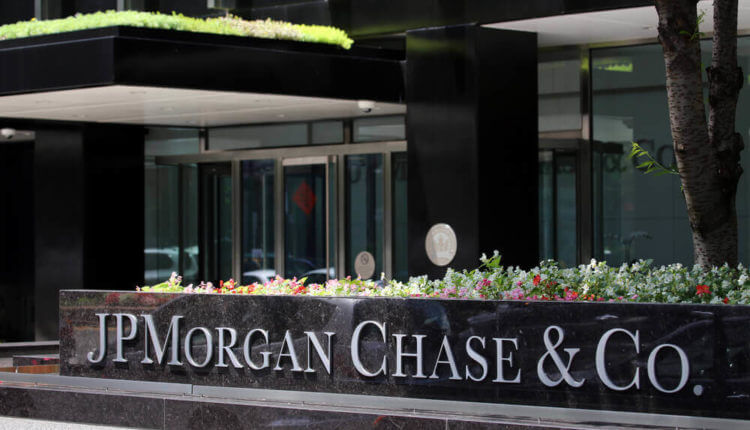 JPMorgan Chase & Co spelled out on a wall in front of a building