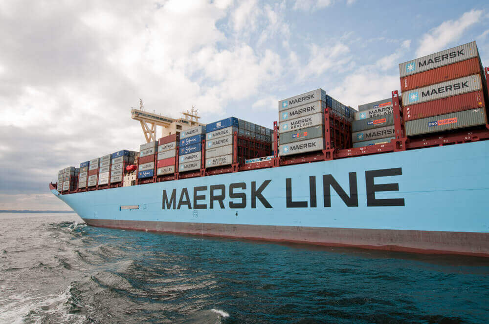 maersk line cargo ship with crates on it
