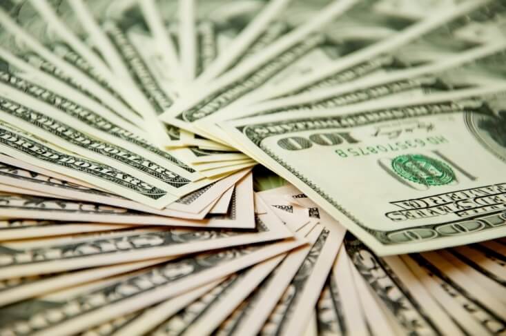 Finance Brokerage-USD News: Dollar banknotes on a spiral arrangement
