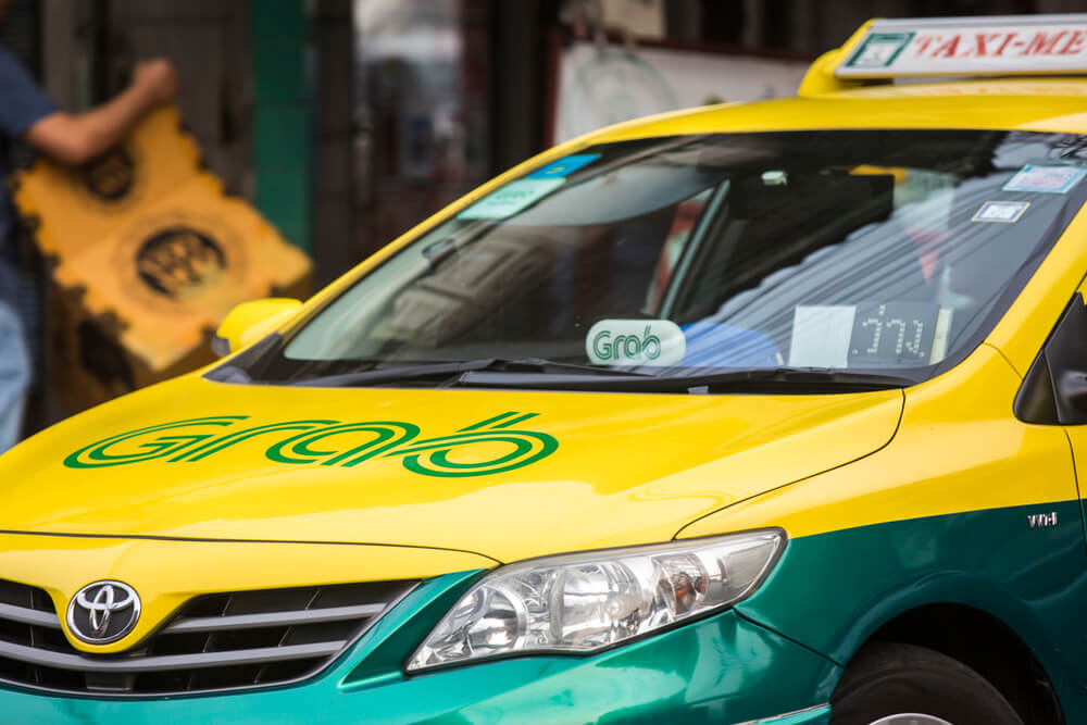 Grab Taxi Now at $14B Upon Settling $1.46B from Vision Fund - Finance Brokerage