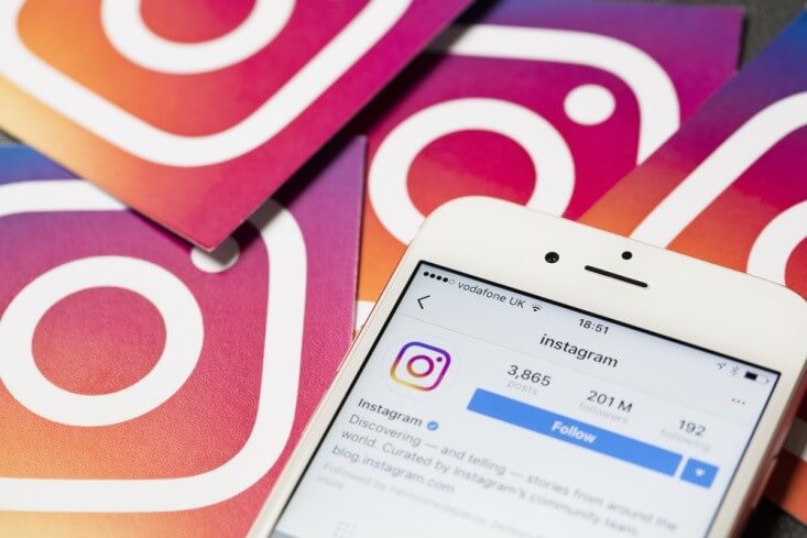 Data Privacy-Instagram app open on a smartphone with IG logos on the background-Finance Brokerage