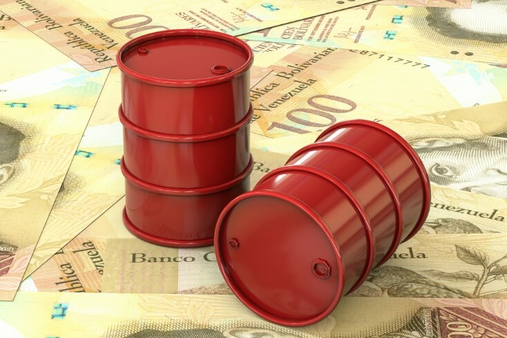 Venezuela oil concept barrels on top of bills