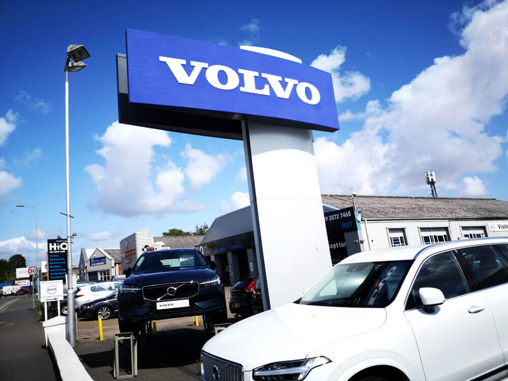 Volvo: Volvo Car Dealership with commercial signs