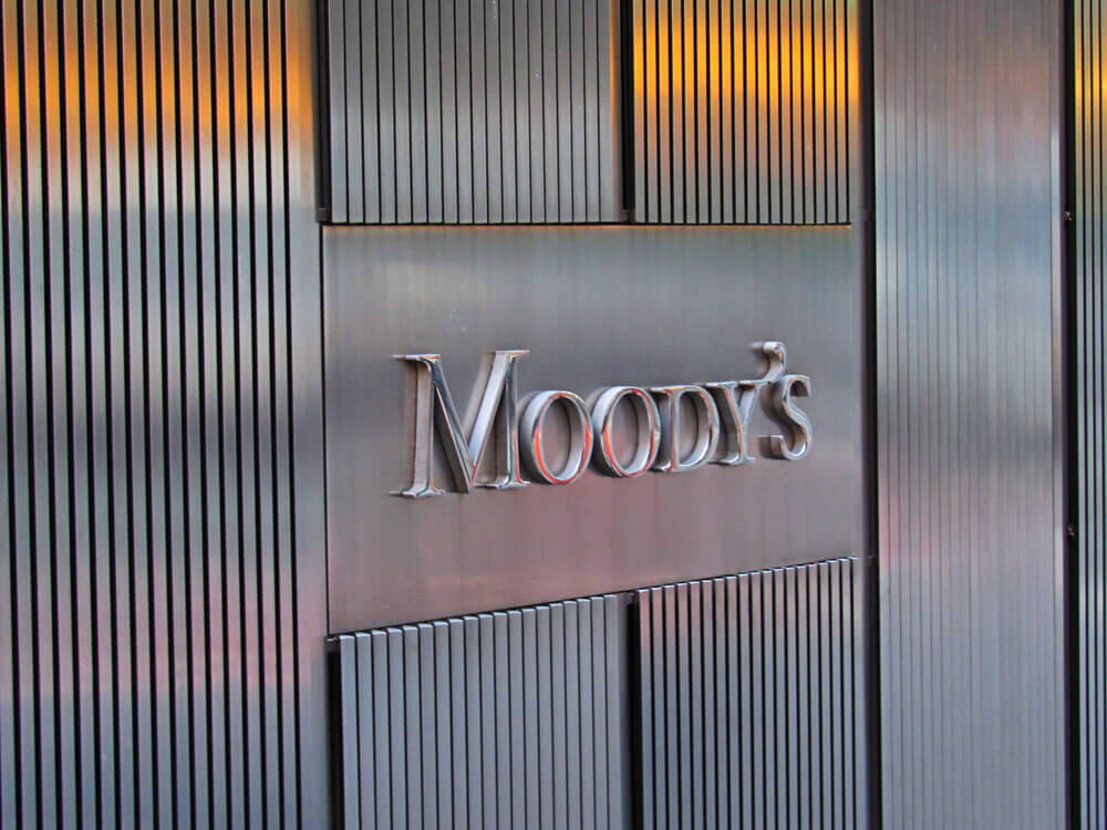Moody’s: Moody's Investor Services sign.