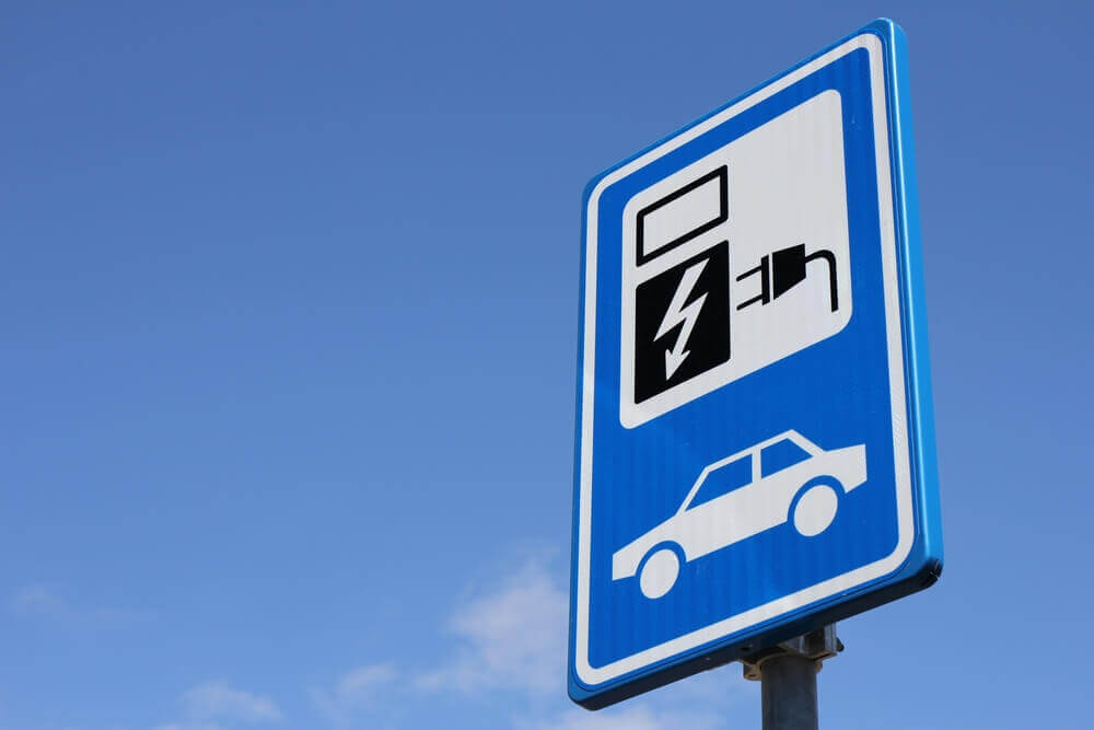Charging Stations: Dutch road sign parking for electric vehicles only.