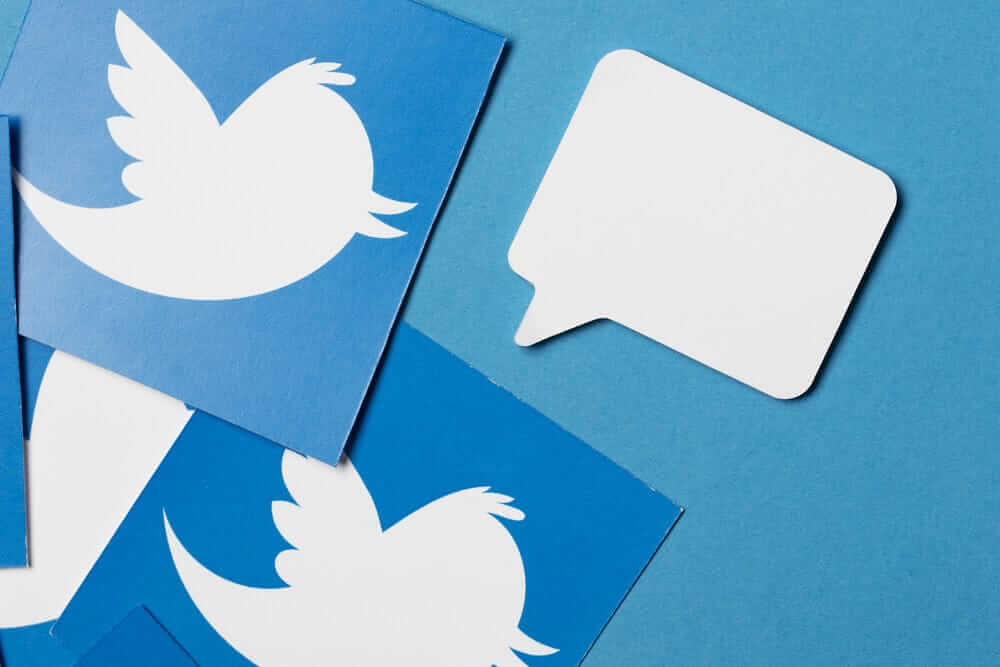 Twitter: Twitter logo printed onto paper.