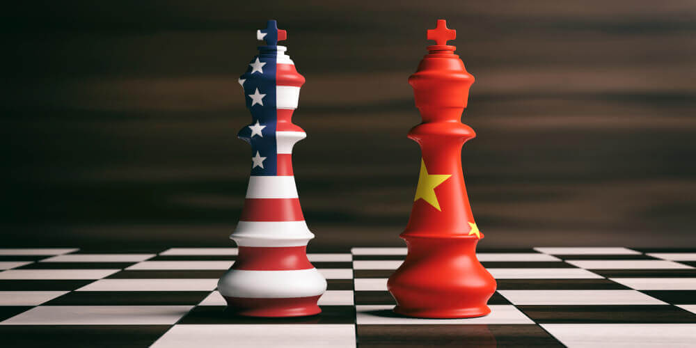 Stock markets: US America and China flags on chess kings on a chess board.