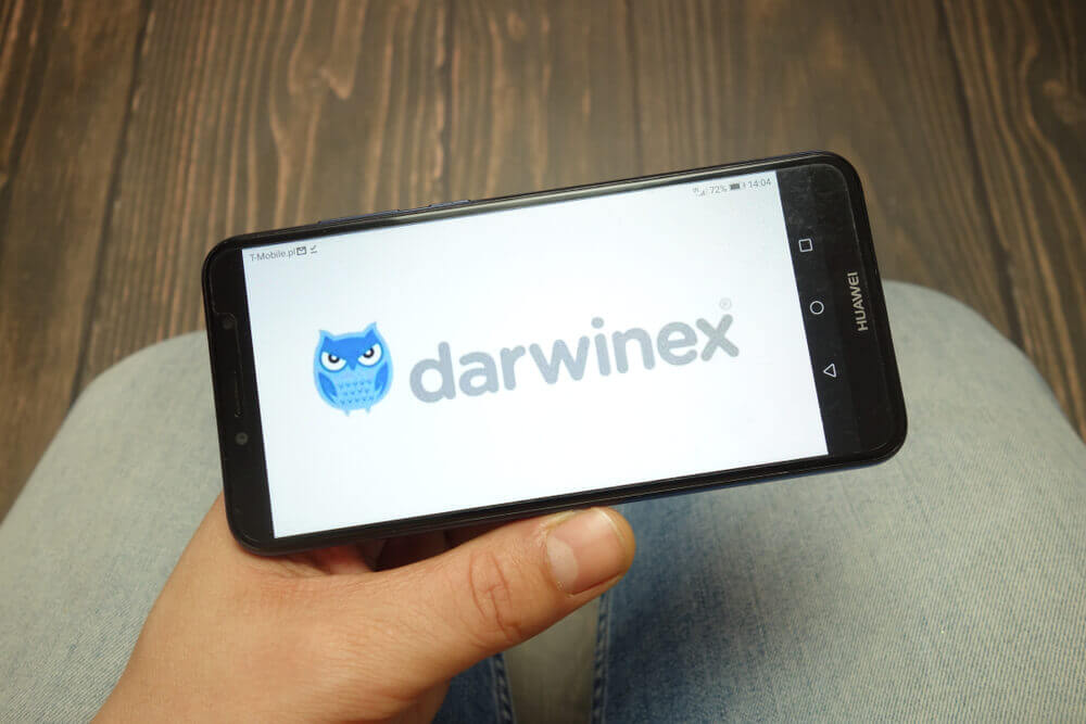 Darwinex broker logo displayed on smartphone