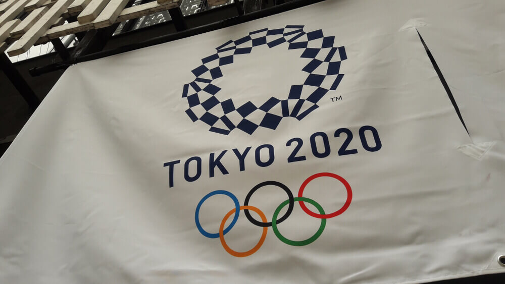 Tokyo 2020 Olympic Games banner with its logo in front of Japan House.