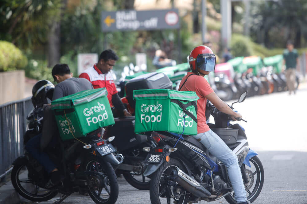 A Grab Food rider deliver food