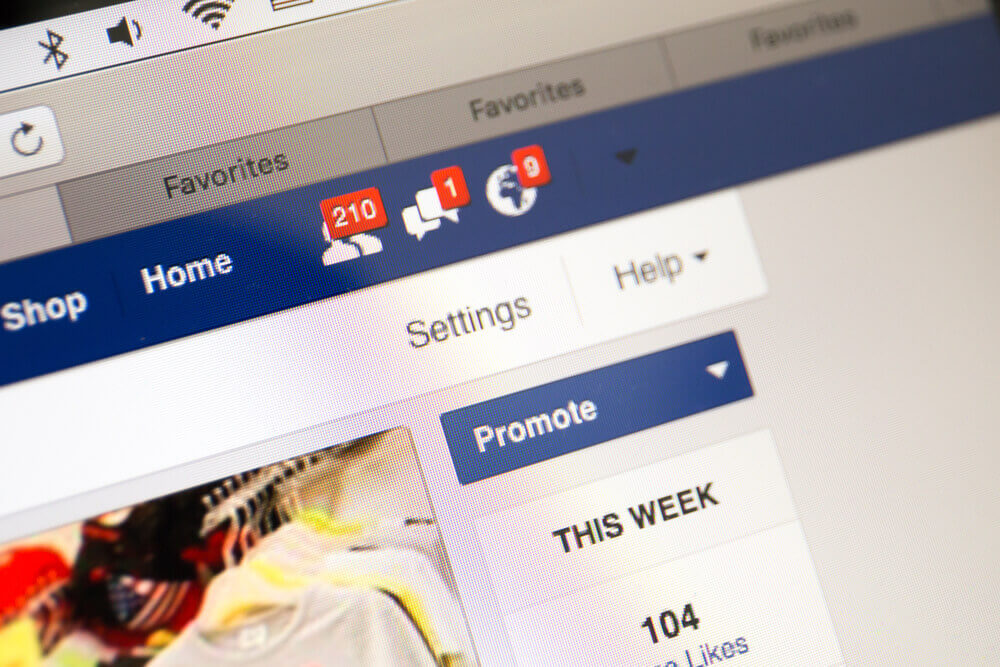 Facebook business page closeup with notifications of new customers like, new messages.