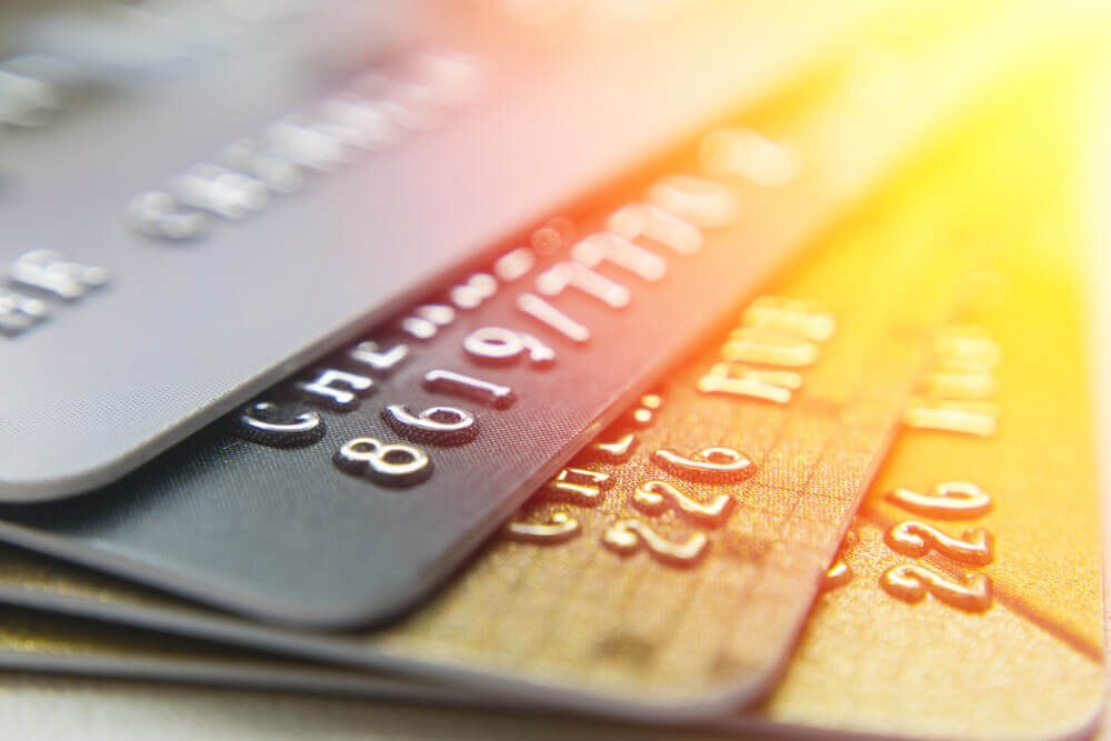 bank account: Gold and platinum credit cards close up.