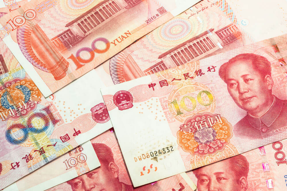 One of hundred Chinese yuan banknotes, Chinese currency as background.