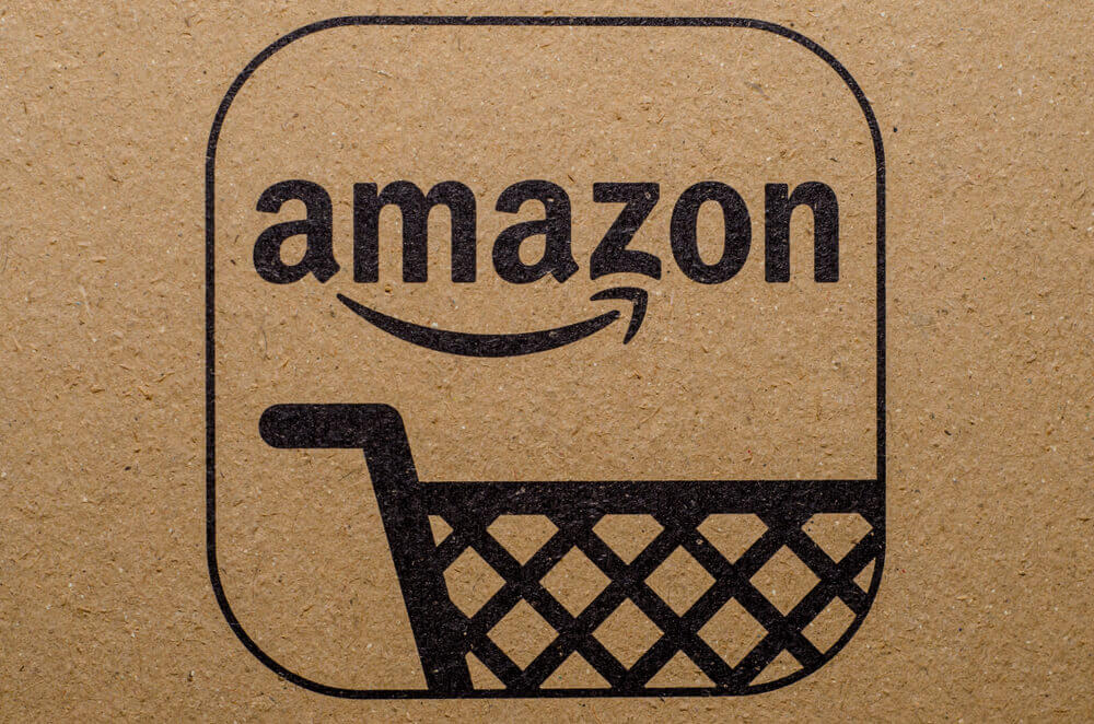 The Amazon Logo with QR code on cardboard envelope.