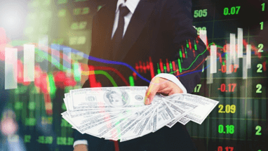 Forex vs stocks The picture displays a businessman holding money bills on digital market – Finance Brokerage