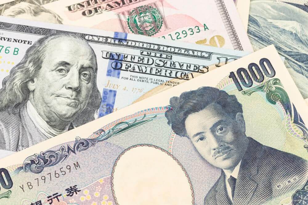 Japanese yen and US dollar bills.