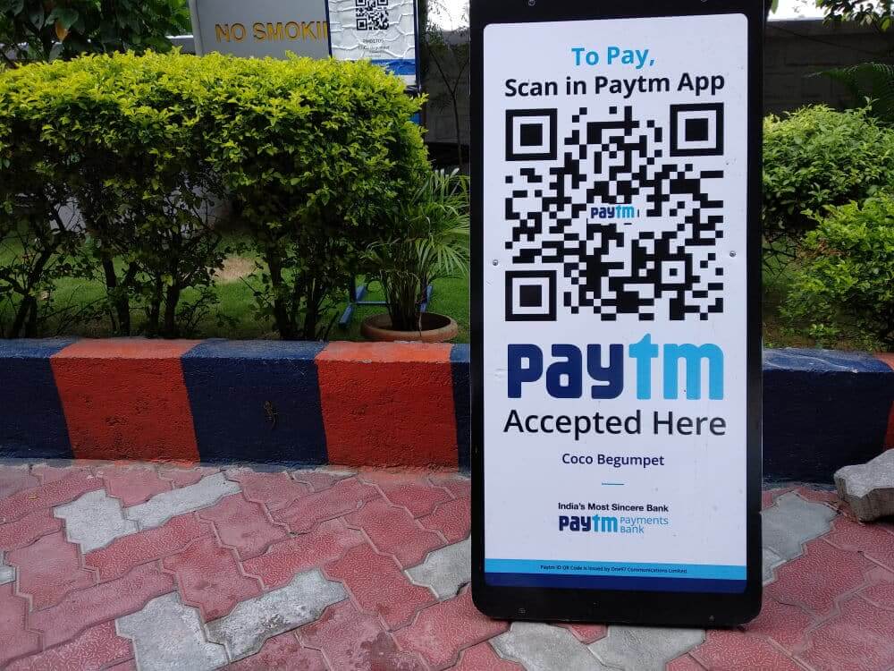 Paytm standee in front of building.