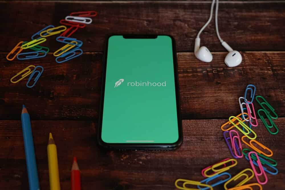 Robinhood Smartphone Screen with Colored Paperclips.