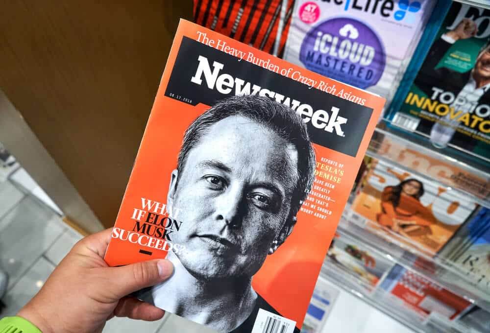 Newsweek magazine with Elon Musk on main page.