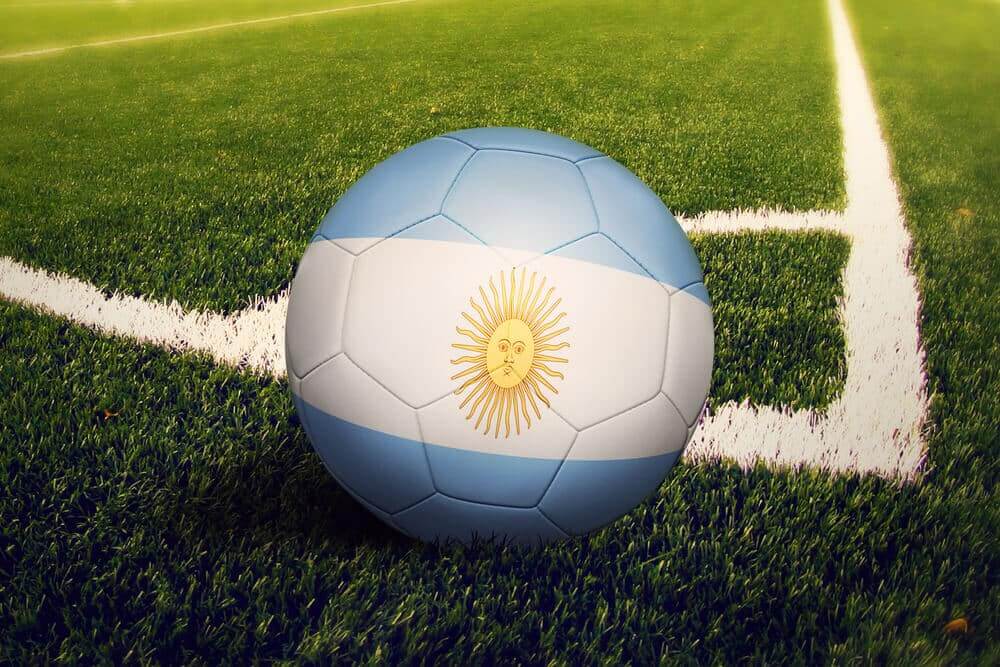 Argentina flag on ball at corner kick position.