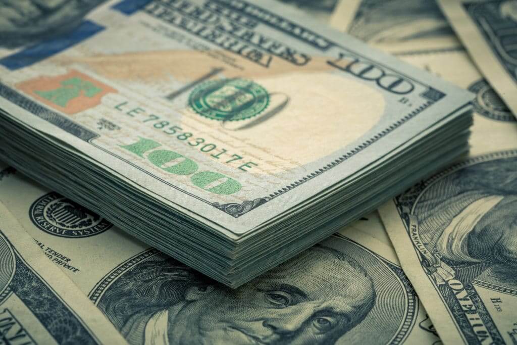 Dollar sees biggest rise in 7 days as COVID infections rise
