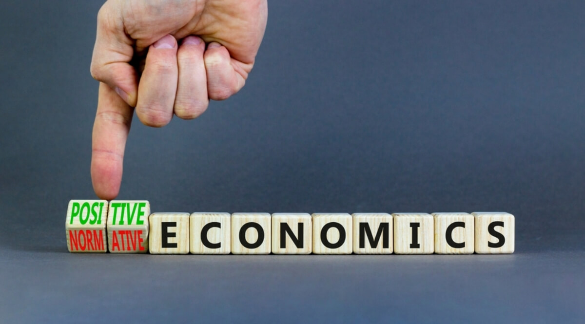 What is positive vs normative economics?